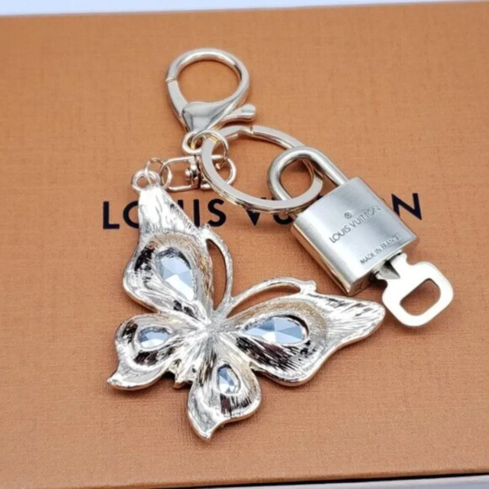 Authentic Louis Vuitton Gold Lock & Box w/ Unbranded Butterfly Bagcharm 122725